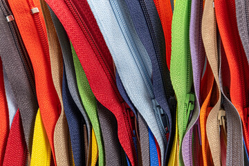 Multicolored Zippers or Zip Fasteners,  used for binding fabric or textile