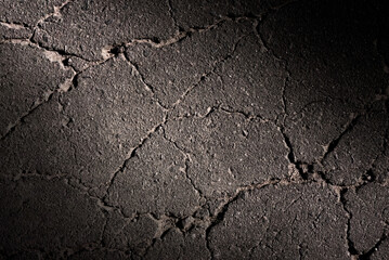 Cracked asphalt texture. Top view. Asphalt. Road background