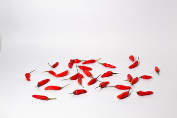 Red cayenne peppers on isolated white background