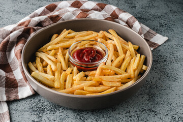 Crispy French Fries with Ketchup, Golden and Tasty Fast Food Snack, Salted and Crunchy Potato Chips