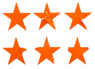 A set of orange star shape paper sticker label isolated on white background.