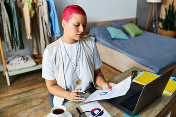 A young woman engages in thoughtful work at her home, surrounded by creative materials and comfort.
