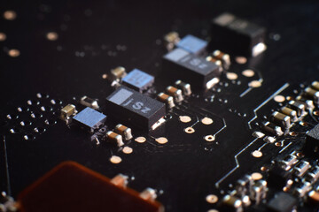 ICs on the motherboard, capacitors, various devices on the motherboard