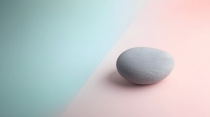 A minimalist composition with a smooth gray stone placed on a soft pastel background, capturing a sense of tranquility. No text, no logo, wide angle shot, cinematic scene, 4k resolution