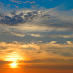Sunrise sky with lighted clouds.
