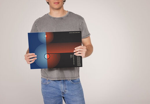Anonymous Man Holding a customisable poster board. PSD mockup template