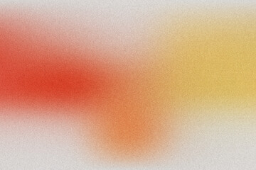 Abstract grainy textured gradient background with soft red and yellow tones