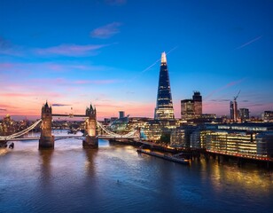 london skyline at dusk with tower bridge and the shard