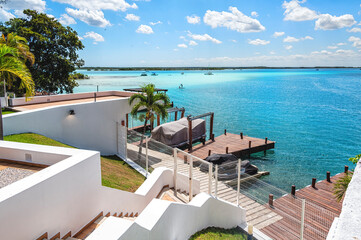 Houses and pier on the shore of the lagoon of Bacalar
