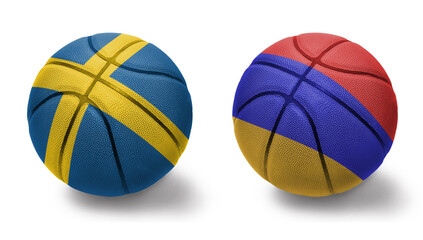Fototapeta premium basketball balls with the national flags of armenia and sweden on the white background.