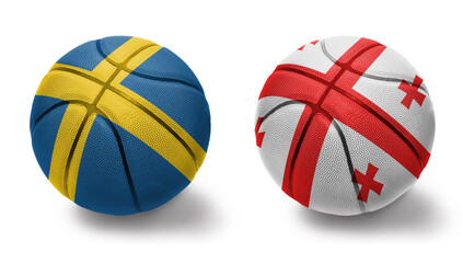 basketball balls with the national flags of georgia and sweden on the white background.