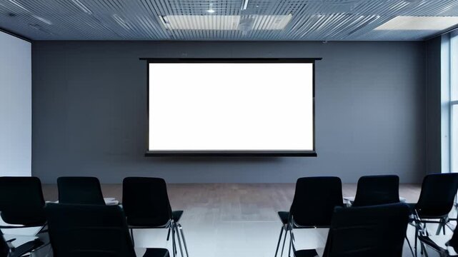 Modern conference room awaits the start of a presentation
