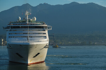 Cruiseship cruise ship liner P World arrival into Vancouver, BC port with scenic mountain glacier...
