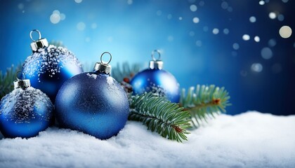 Merry Christmas card. Blue christmas balls and baubles on the snow with fir branches.