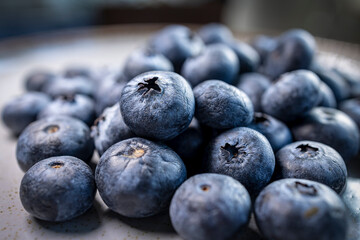 fresh blueberries in the basket on wooden table
