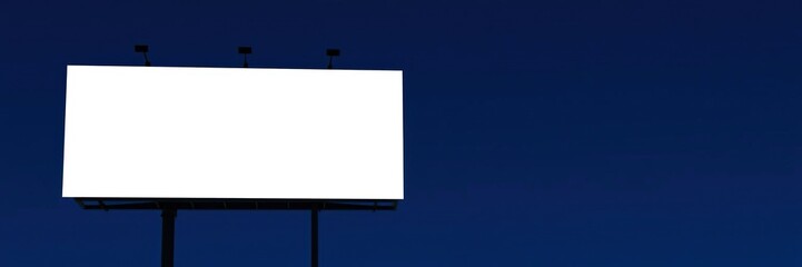 Obraz premium Bright white billboard against a deep navy blue background, contemporary urban landscape, glowing logo