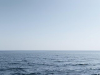 Obraz premium A vast expanse of calm balai coast with a grey and blue ocean stretching into the distance, cloudy sky, grey clouds