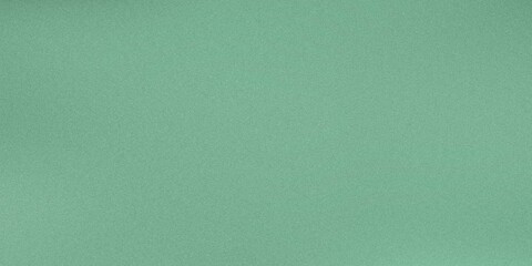 soft green background with a fine grain texture, ideal for design or wallpaper

