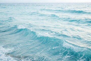 A serene ocean wave pattern with gentle blue hues and delicate white ripples, wavy lines, aquatic life