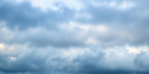 Fototapeta premium Soft focus cloudy scene with mix of light dark blue and white clouds, atmospheric conditions, white clouds, light blue colors