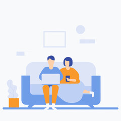 A man and a woman are sitting on a couch, both using their cell phones. The man is looking at his laptop, while the woman is looking at her phone. Concept of relaxation and leisure
