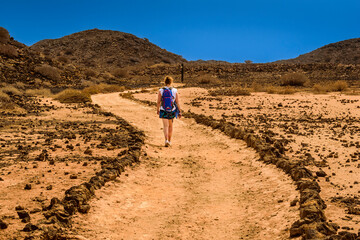 A tourist on Lobos Island on a sunny day