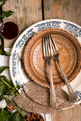 Cozy Christmas Table with Seasonal Greenery and Lace