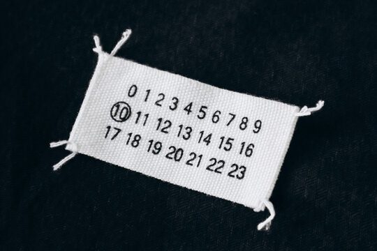 The famous Maison Margiela label with numbers and four stitches