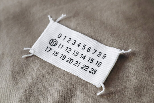 The famous Maison Margiela label with numbers and four stitches