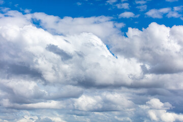 White clouds against a blue sky