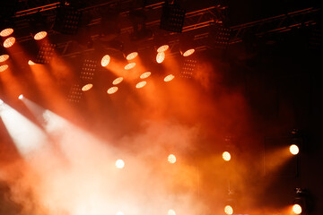 Red-orange color on stage at a concert