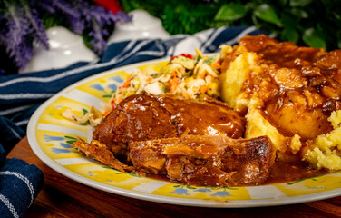 Stewed pork neck in sauce.