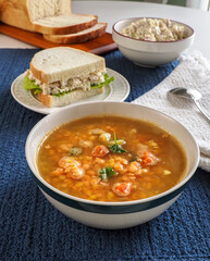 Lentil Soup and Chicken Salad Sandwich on Blue Vert