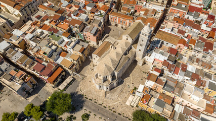 Fototapeta premium Aerial view of the Basilica of Santa Maria Maggiore in the historic center of Barletta Puglia, Italy. It is the cathedral of the city and it was built in Romanesque and Gothic styles.