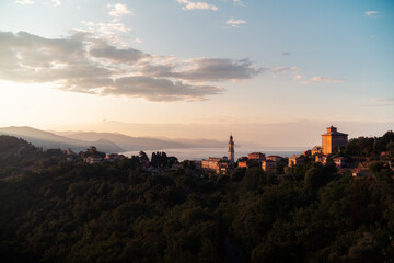Naklejka premium Italian riviera with town of San Lorenzo della Costa at sunrise, Liguria, Italy