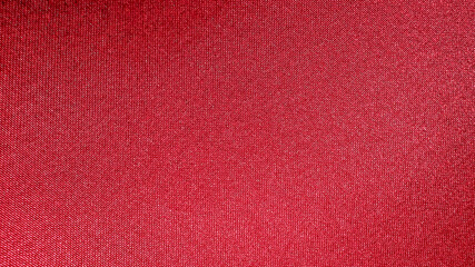 Fototapeta premium Red ruby glossy satin fabric texture, background