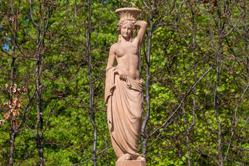 Sculptures in the gardens of Wilanow Palace. Historical Monuments. Warsaw