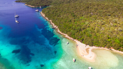 Epirus, Greece. Sivota - stunning aerial drone video of turquoise sea known as Blue Lagoon and...