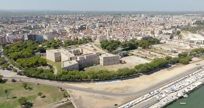 Aerial view of the castle located in Barletta, Puglia, Italy. It was a medieval fortress built on the coast of the Mediterranean Sea. Today it's a museum.