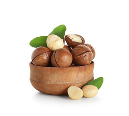 Wooden bowl with tasty macadamia nuts on white background