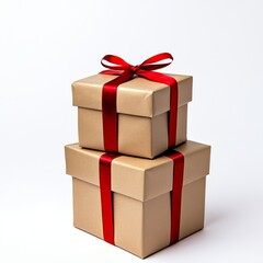 Obraz premium Beautifully stacked brown gift boxes adorned with vibrant red ribbons are perfect for celebrations and surprises, making them ideal for Christmas, birthdays, and all special occasions