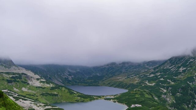 Evolving Tatra Peaks: Picturesque Lake Scene Timelapse