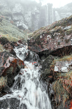 A rocky misty waterfall, Rough Burn, Mistylaw Muir, Renfrewshire,Scotland,UK