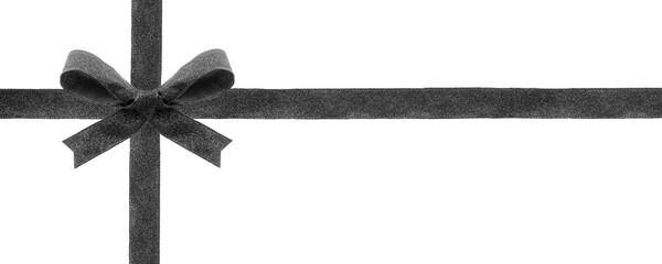 Black fabric gift bow and ribbon. Wrapped box layout isolated on a white background.