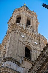 Obraz premium Close-up view of a tower with detailed architecture and golden dome