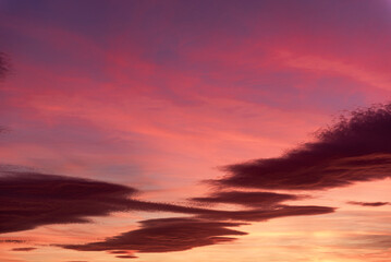 Fototapeta premium Vivid Sunset Sky with Colorful Clouds