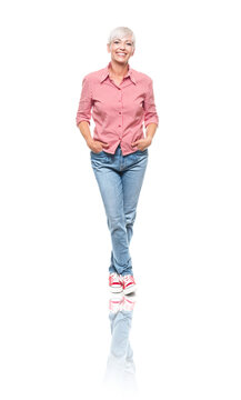 Full body of smiling beautiful adult woman. Cheerful middle aged woman standing and posing, isolated on white background.