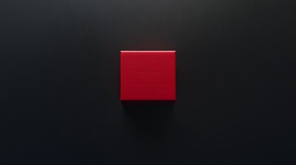 red and minimalistic gift box against dark background