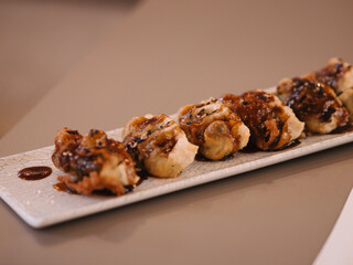a plate of fried meat in a restaurant
