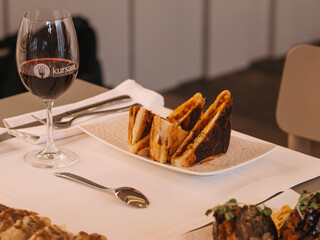 a table set with sandwich in a restaurant